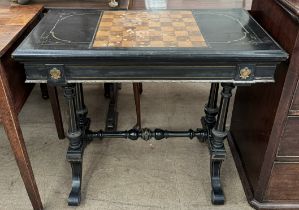 A Victorian ebonised brass inlaid games / card table, the top with chequer board,