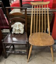 A mid 20th century stick back dining chair together with a ladder back chair and a plaster gargoyle