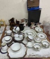 An Adderley's pottery part tea service together with a Wedgwood part dinner set,