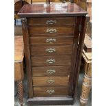 An Edwardian mahogany Wellington chest with eight graduated drawers on a plinth base