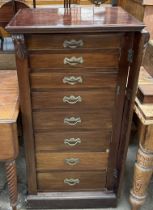 An Edwardian mahogany Wellington chest with eight graduated drawers on a plinth base