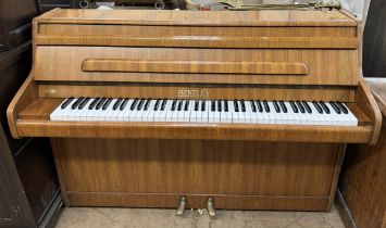 A walnut cased Bentley upright piano, metal framed overstrung, No.