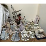 A collection of Coalport cottages together with Wedgwood porcelain figures, Sitzendorf figures,