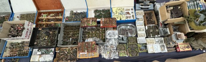 A collection of Italeri Saracen Warriors, boxed together with model buildings,
