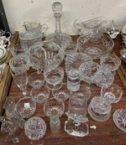 A crystal glass decanter together with cut glass bowls,