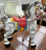 A Mobo tin plate child's ride on horse