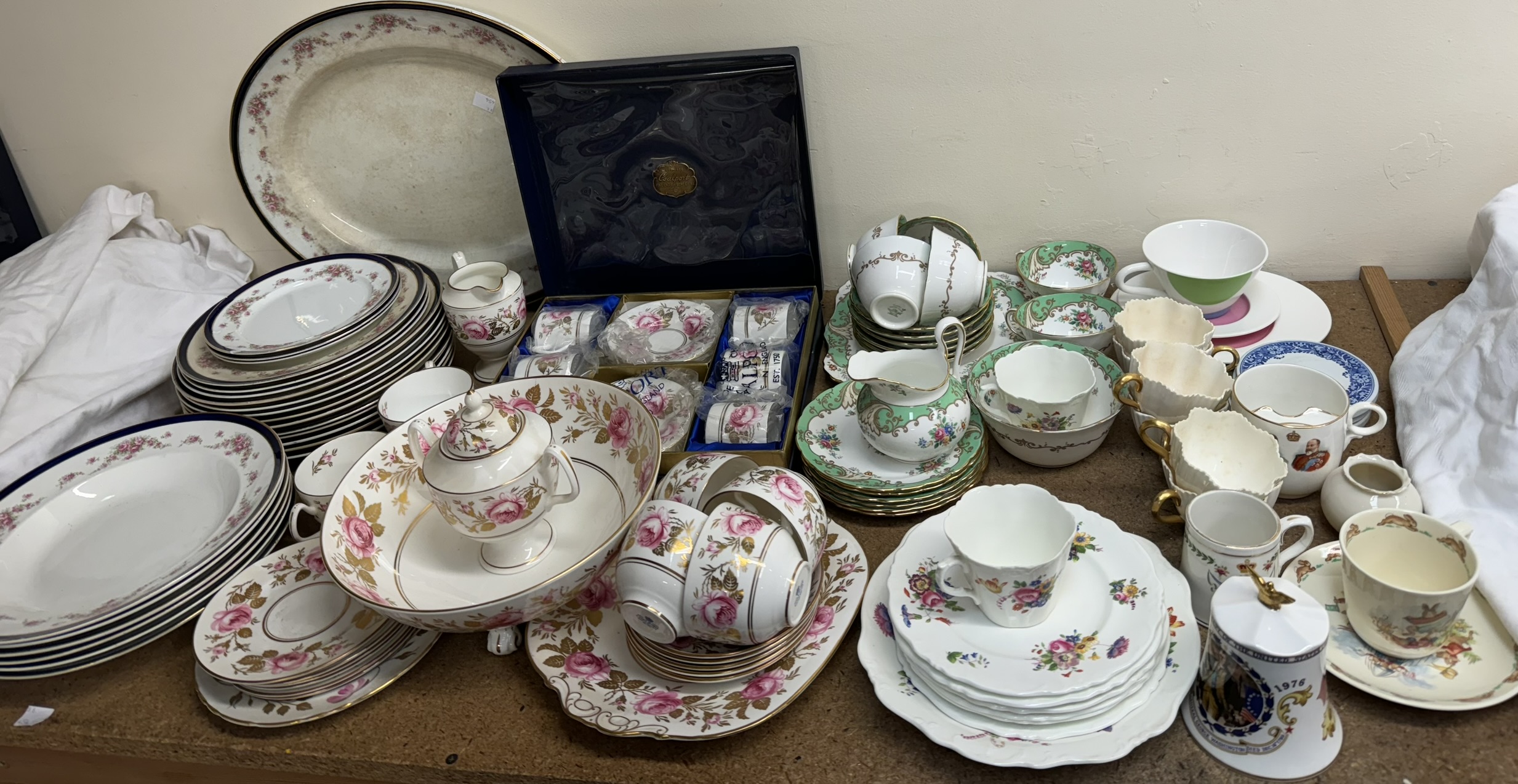 A Coalport rose decorated part tea service together with a matching cased part coffee set,