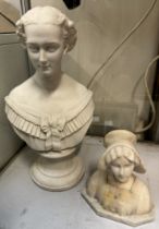 A Parian portrait bust of a maiden with her dress on her shoulders on a socle base together with a