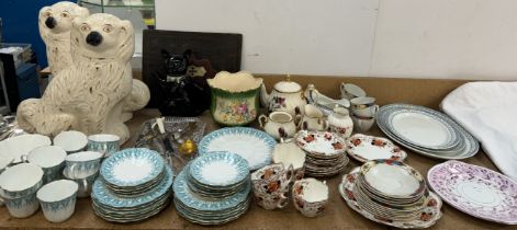 A pair of Staffordshire dogs together with assorted part tea and dinner services etc