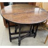 A small oak gateleg table on turned legs