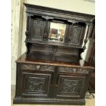 A 19th century Low Countries carved oak mirrorback sideboard,