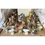 A collection of Royal Worcester model birds together with other model birds etc