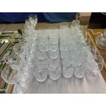 A collection of Stuart crystal drinking glasses including wine glasses, tumblers,
