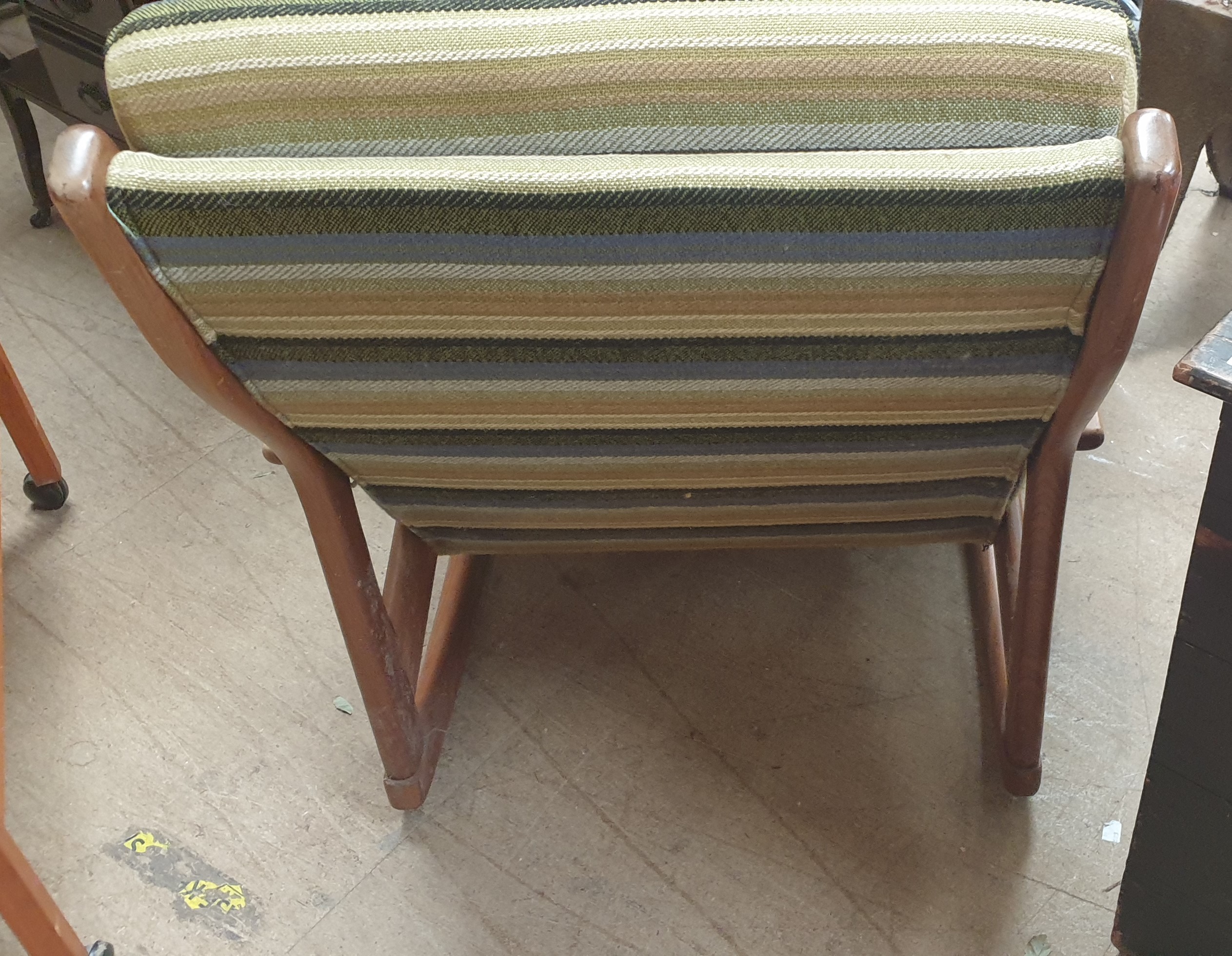 A mid 20th century teak rocking chair together with a teak drinks trolley CONDITION - Image 6 of 12