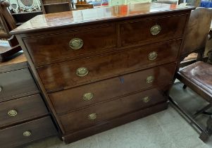 A 19th century mahogany chest with two short and three long drawers on a plinth base