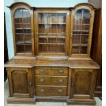 A 20th century walnut sideboard with a double glazed domed top,