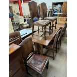 An early 20th century oak refectory table and six chairs