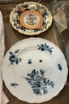 A Meissen blue and white porcelain plate decorated with flowers and leaves together with a 19th