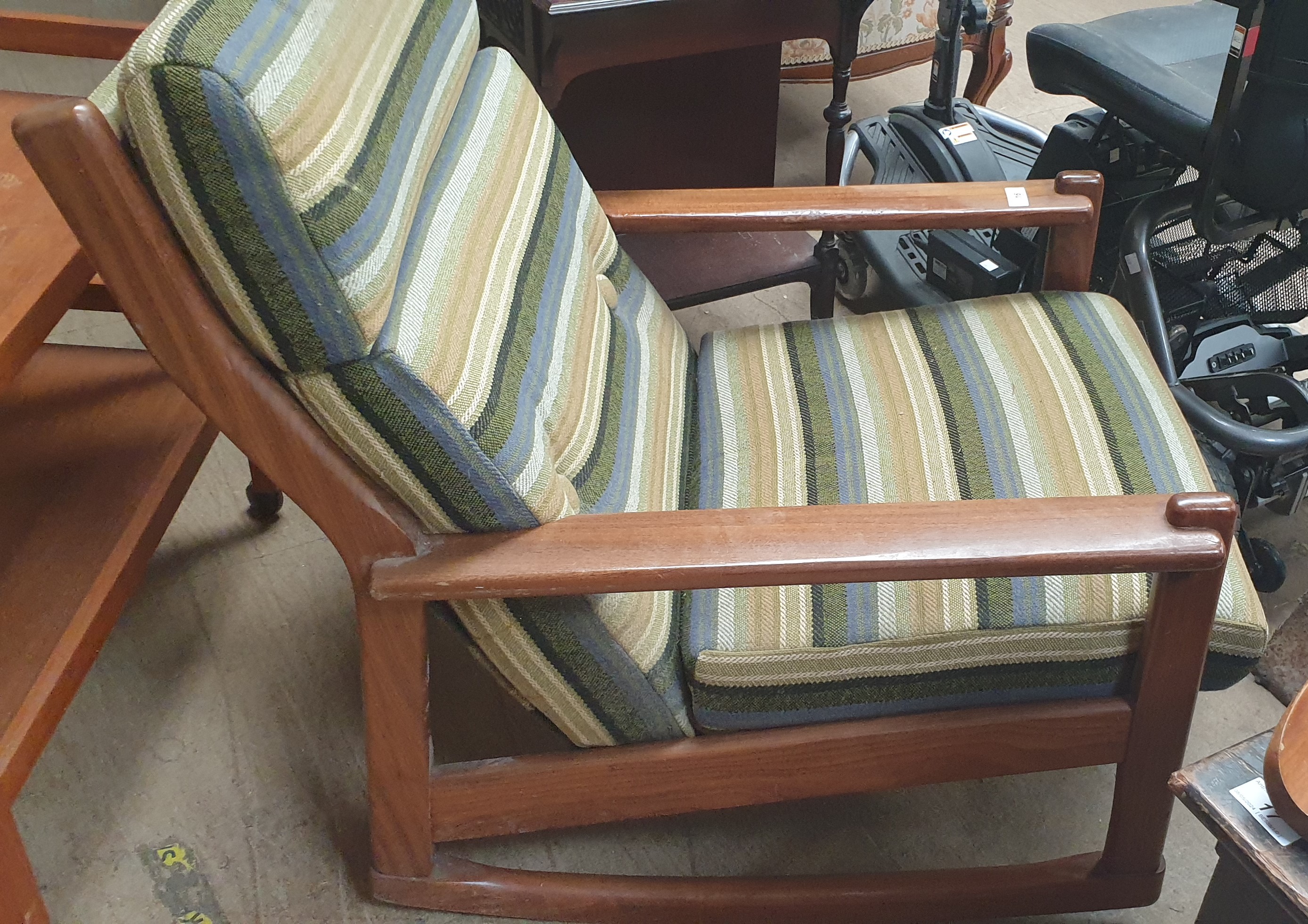 A mid 20th century teak rocking chair together with a teak drinks trolley CONDITION - Image 7 of 12