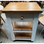 A cream painted pine butchers block,