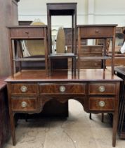 An Edwardian mahogany dressing table with five drawers and a kneehole together with a pair of
