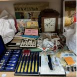 An oak mantle clock, together with assorted coins, cased silver spoons, stamps,