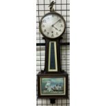 The New Haven Clock Co wall clock with a silvered dial and Arabic numerals with an eagle surmount,