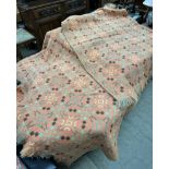 A pair of Welsh single blankets with an orange ground and brown,