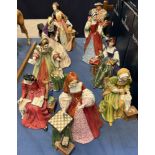 A set of nine Royal Doulton figures of Henry VIII HN3458 No 2203/9500,