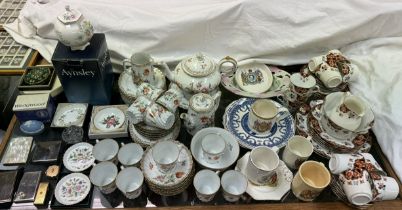 A Dresden porcelain part tea service together with another pottery part tea set,
