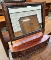 A 19th century mahogany toilet mirror with a rectangular plate and three drawers