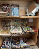 A large collection of comics including 2000AD featuring Judge Dredd, numbers 229-242, 331-335,