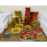 Assorted Poole pottery Delphis pattern yellow ground vases and plates together with a large