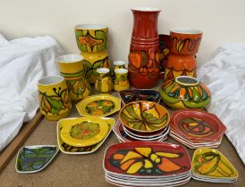 Assorted Poole pottery Delphis pattern yellow ground vases and plates together with a large