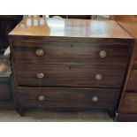 A 19th century mahogany chest with three long drawers on bracket feet