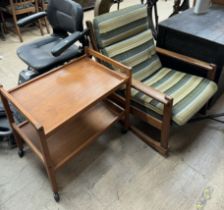 A mid 20th century teak rocking chair together with a teak drinks trolley CONDITION