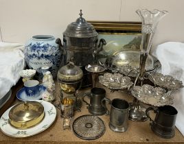 A silver and glass teapot stand together with an electroplated and glass epergne an electroplated