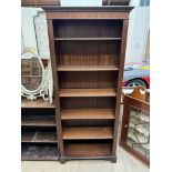 A reproduction mahogany bookcase