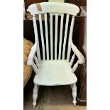 A white painted kitchen slat back chair