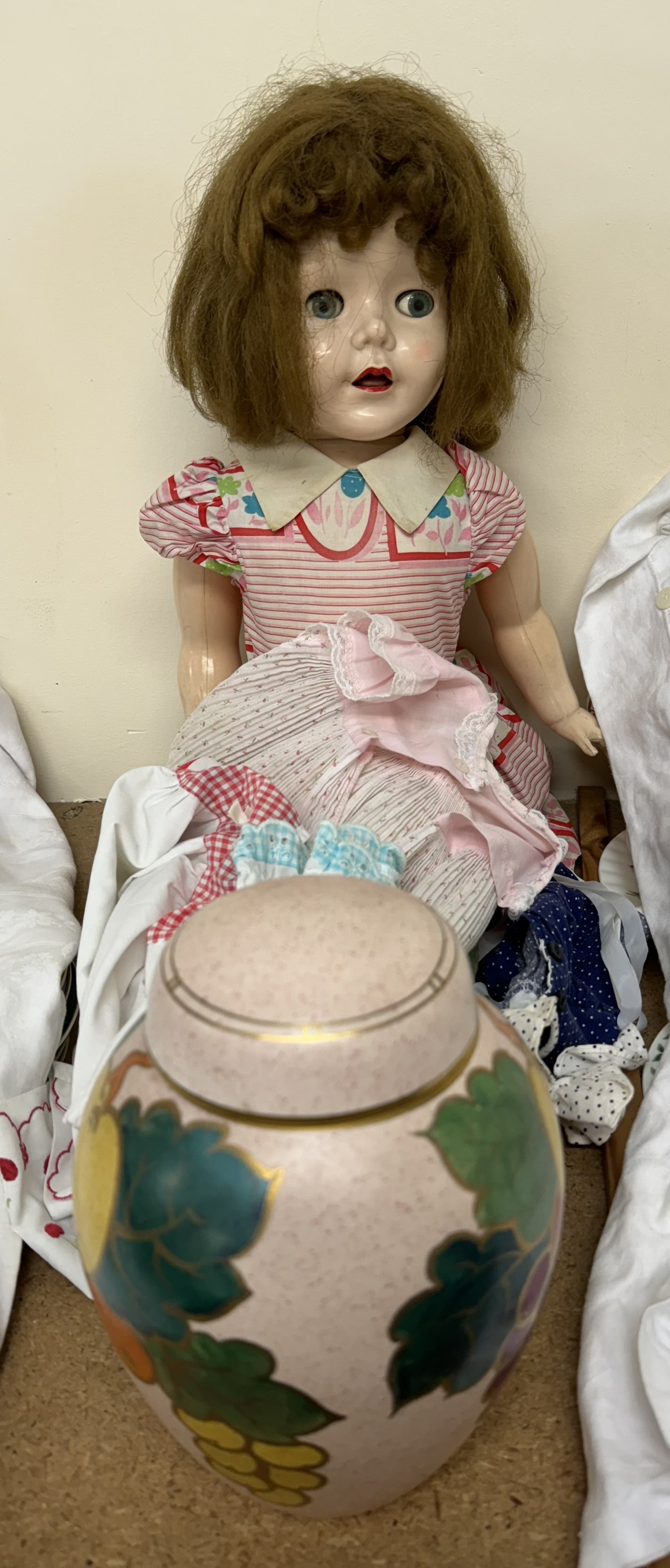 A celluloid jointed doll together with a Royal Venton ware ginger jar and cover