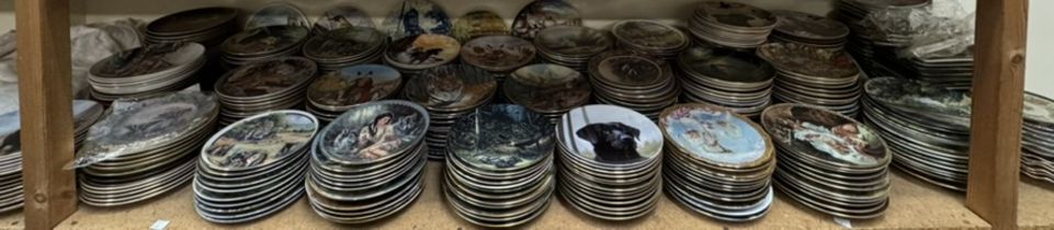 A large collection of collectors plates including Bradford Exchange, Danbury Mint, Royal Doulton,