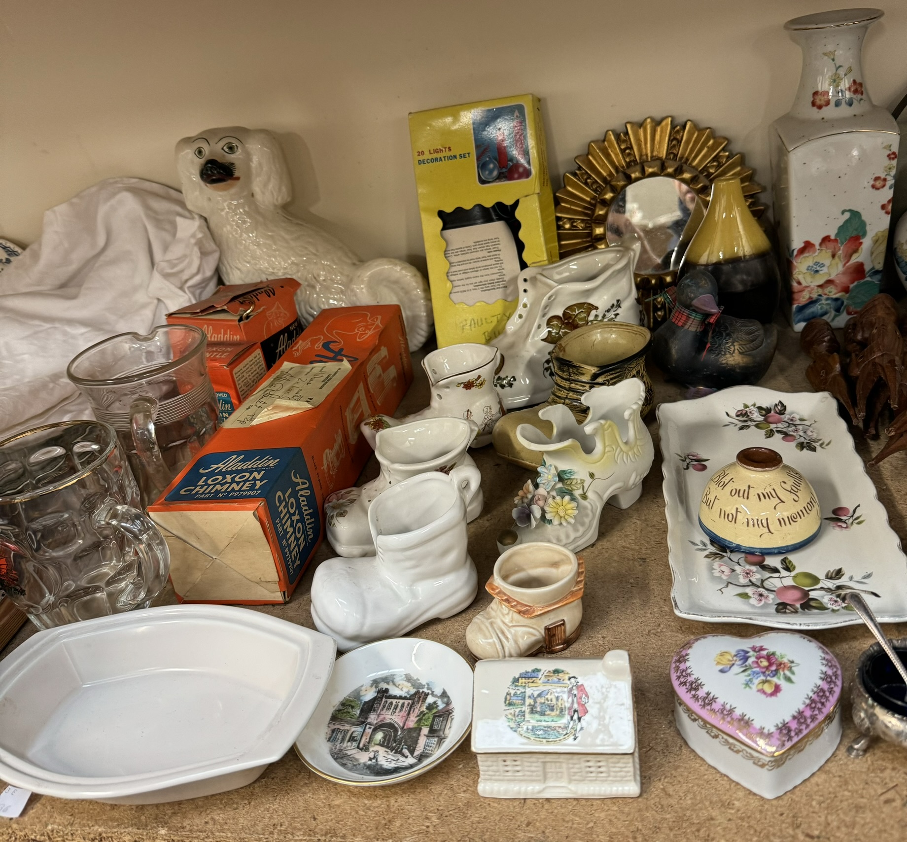 A Victorian silver open table salt together with black and white prints of nudes, vases and covers,