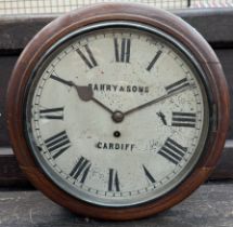 A Railway type timepiece of circular form with a painted dial and Roman numerals inscribed Parry