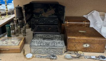 A collection of miner's lamps together with jewellery boxes,