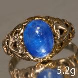 A CABOCHON SAPPHIRE GOLD RING