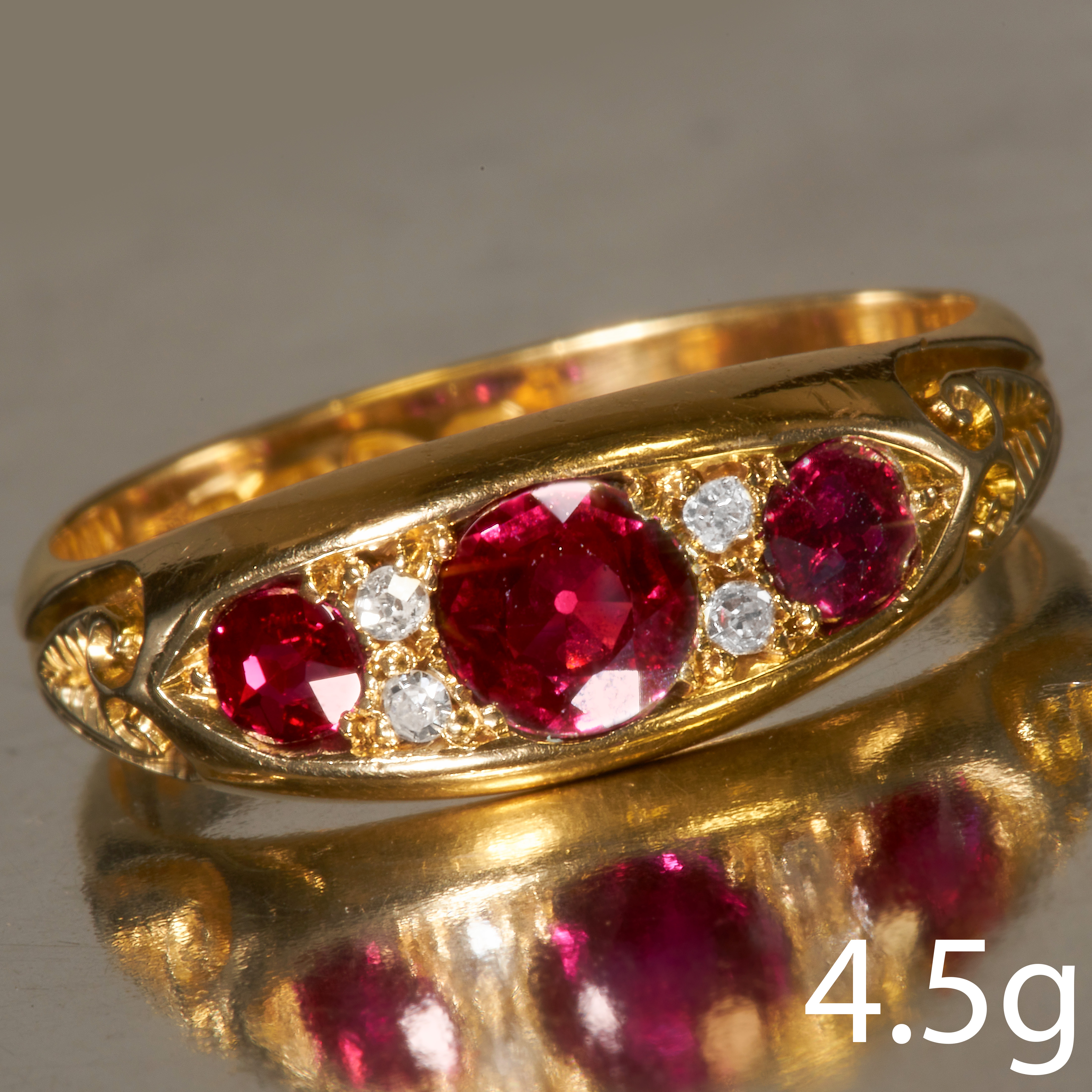 EDWARDIAN RUBY AND DIAMOND SEVEN STONE RING