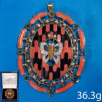 LARGE AND UNUSUAL CORAL ONYX AND DIAMOND PENDANT