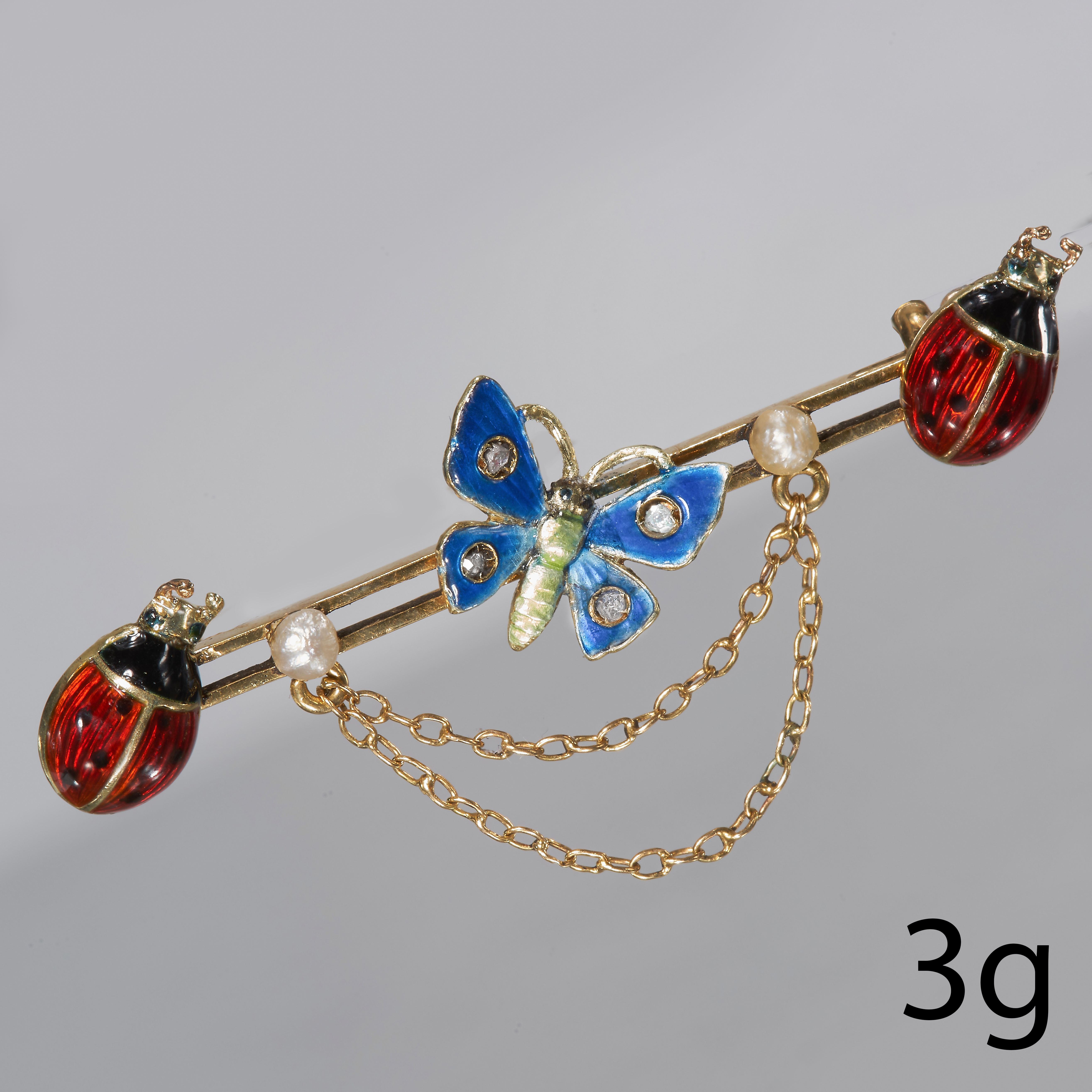 EDWARDIAN ENAMEL, DIAMOND AND PEARL BUTTERFLY AND LADYBIRD BAR BROOCH