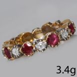 ANTIQUE DIAMOND AND GARNET FULL ETERNITY RING