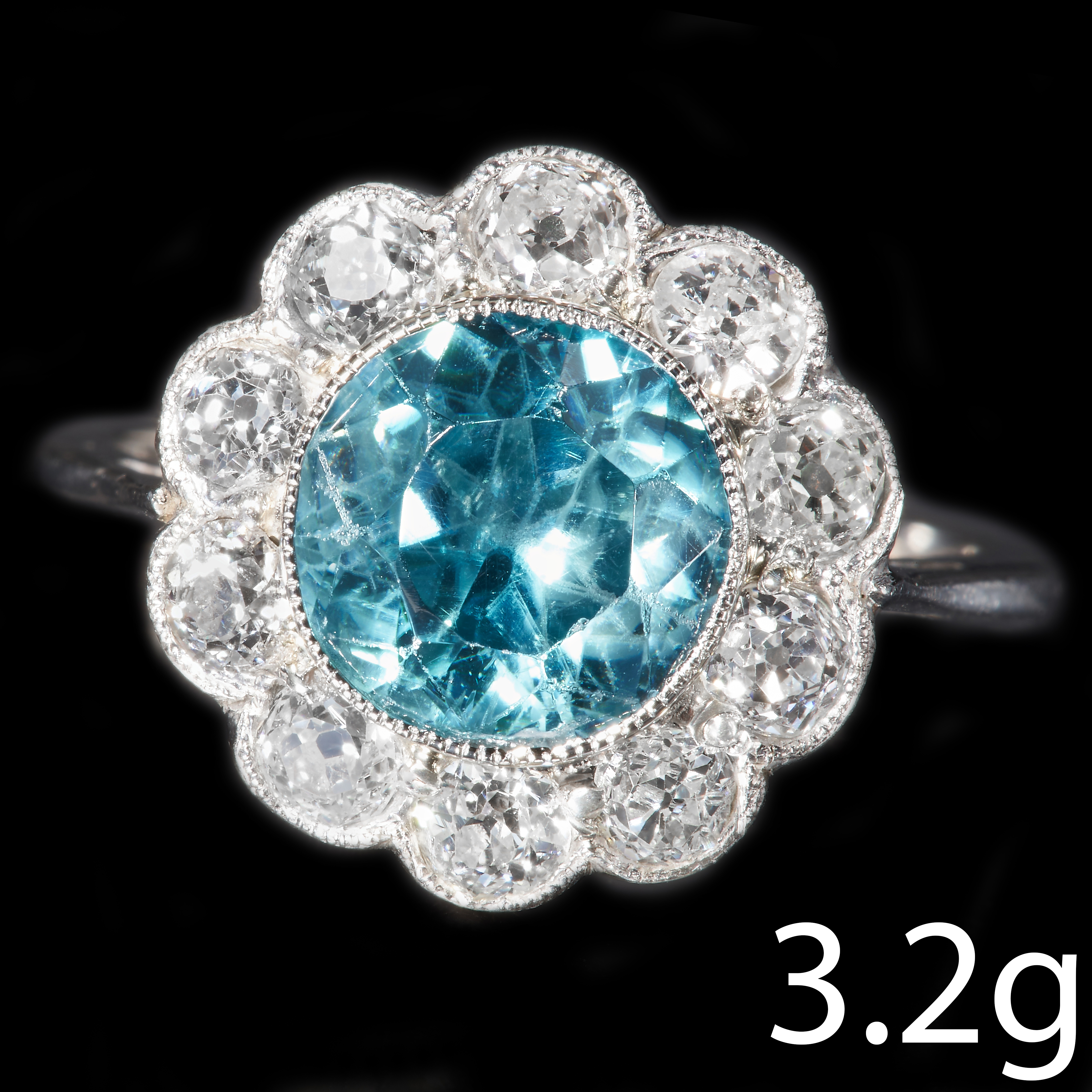 ZIRCON AND DIAMOND CLUSTER RING